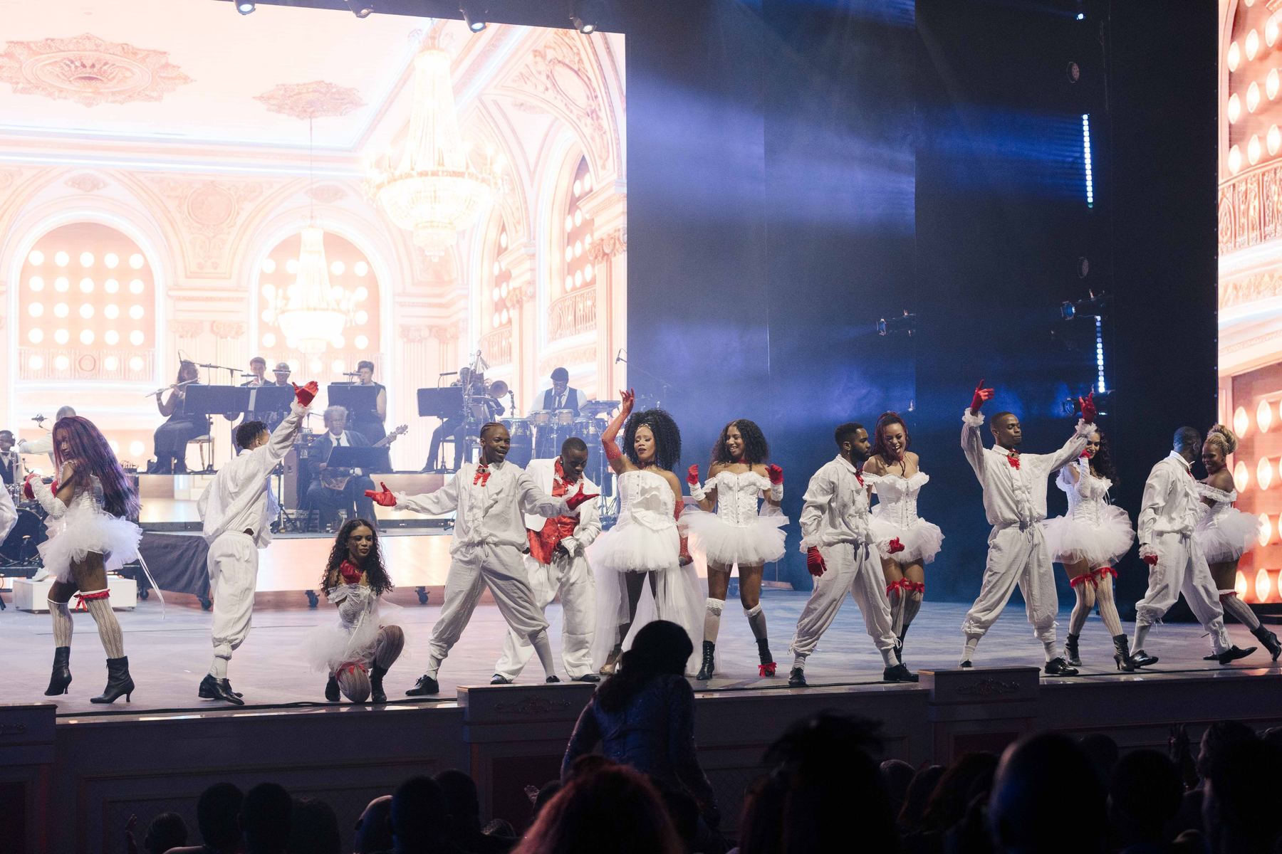 Dancers and orchestra on the theatre stage